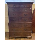 A George III mahogany chest on chest, having two short and three graduated long drawers above