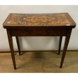 A late 19th century Dutch mahogany card table, with floral marquetry inlaid decoration, on