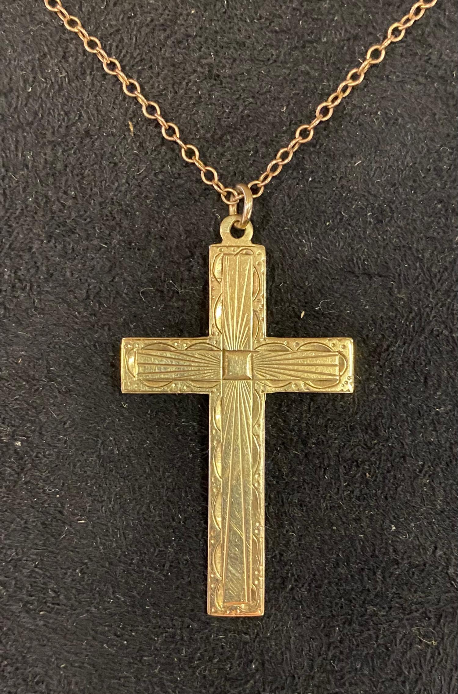 A 9ct gold cross, inscribed and dated 1952, on a chain, 4.1 g