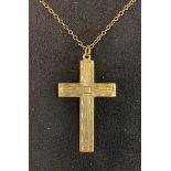 A 9ct gold cross, inscribed and dated 1952, on a chain, 4.1 g