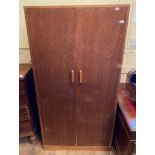 A Heals oak two door wardrobe, 91 cm wide Report by RB Has been used, a little bit faded and stained
