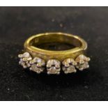 ***Withdrawn***An 18ct gold and floating five stone diamond ring, approx. ring size R½, 10.8 g (