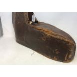 A 19th century large leather gout boot, 54 cm wide