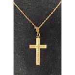 A yellow coloured metal cross and chain Report by RB 5.9 g