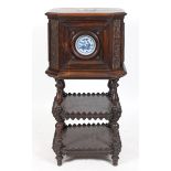 An unusual 19th century Continental walnut cabinet, of square form with canted corners, carved