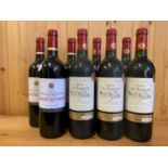 Three bottles of Chateau Saint-Louis Vieux Galvesse Lalande de Pomerol, 2011, and five bottles of