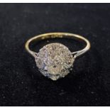 A gold and platinum diamond flowerhead ring, approx. ring size N½, 2.4 g (all in) Report by RB You