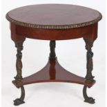 A French mahogany guerridon, with bronze figural supports, on a concave sided platform base and
