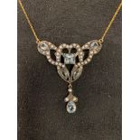 A modern Art Nouveau style pendant necklace, inset with white and blue stones Report by JS Note: