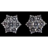 A pair of 18ct white gold and diamond flowerhead earrings RB report Estimated diamonds 1.61ct