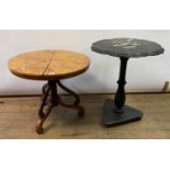 A table, veneered in birdeye maple, top split, 62 cm diameter, and a papier mache table, on a