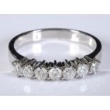 An 18ct white gold and seven stone diamond half hoop ring, diamonds approx. 0.50ct, approx. ring