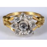 A gold and diamond flowerhead cluster ring, diamonds approx. 0.80ct