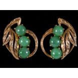 A pair of 14ct gold and jade screw back earrings