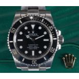A gentleman's stainless steel Rolex Submariner wristwatch, 114060, with plastic bezel protector,