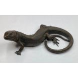 An early 20th century bronze lizard, 15 cm wide RB Lacking a couple of toes.