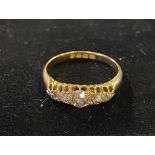 An 18ct gold and five stone diamond half hoop ring, approx. ring size M½, 2.8 g (all in) has been