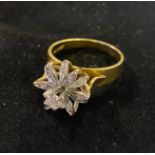***Withdrawn***An 18ct gold and diamond set flowerhead ring, approx. ring size R, 8.4 g (all in)