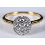 An 18ct gold and diamond cluster ring, approx. ring size N½ Report by RB probably 21st century