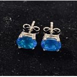 A pair of oval apatite stud earrings, set in silver
