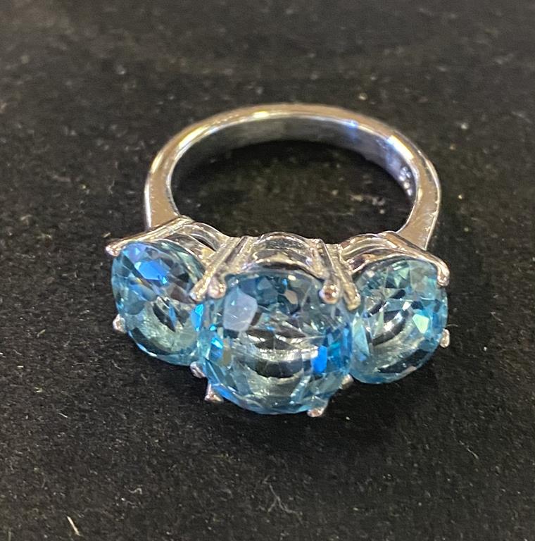 A silver and three stone blue topaz dress ring, approx. ring size N½ Report by RB Modern