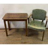 A mid 20th century armchair, a side table, 74 cm wide, an Arts and Crafts style oak stool, 83 cm