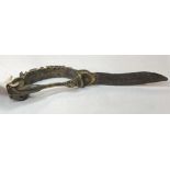 An Indian Bichawa, the handle with figural decoration, and a steel blade, 23 cm