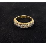 An 18ct gold and ten stone diamond half hoop ring, approx. ring size O½, 6.3 g (all in) Report by RB