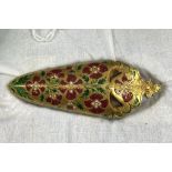 An Indian gold chape, with floral enamel decoration, in green and red, slight loss, 6.5 cm Report by