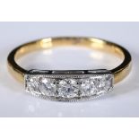 An Art Deco style 18ct gold and five stone diamond ring, approx. ring size L½ generally good, centre