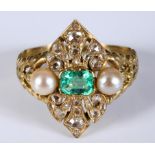 A yellow coloured metal, emerald, diamond and seed pearl ring, of pierced lozenge form, approx. ring