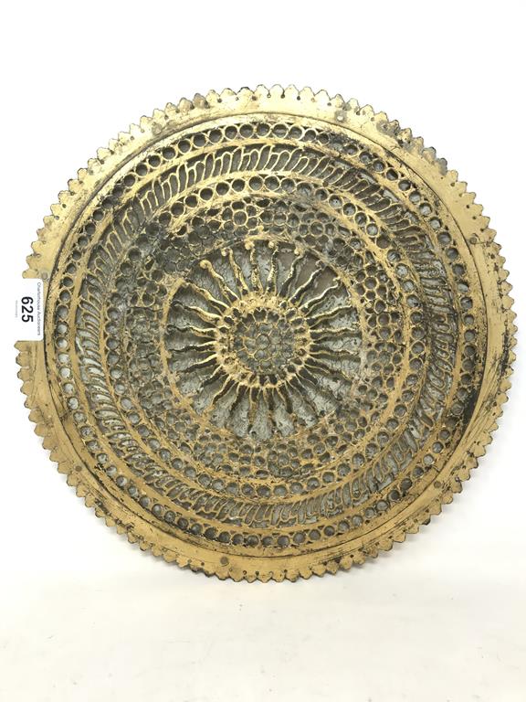 An Indian gilded copper chakra, 31 cm diameter