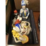 A modern porcelain pincushion head, and four other similar figures (5) This item is 20th/21st