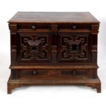 A 17th century oak mule chest, the lift up top above a false frieze drawer and geometric moulded