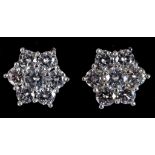 A pair of 18ct white gold and diamond flowerhead earrings RB report Estimated diamonds 1.61ct