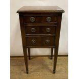 A mahogany bedside chest, having three drawers, on tapering square legs with spade feet, 38.5 cm