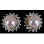 A pair of white gold, cultured pearl and diamond stud earrings