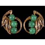 A pair of 14ct gold and jade screw back earrings
