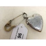 A modern silver coloured metal novelty vesta, in the form of a heart, and a pin (2) Report by JS