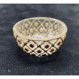 A Mughal rock crystal cup, with gem stud decoration, 4.5 cm diameter very small chip, some of the