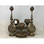 An Indian pair of silver coloured metal filigree work rosewater sprinklers, 34 cm high, and three