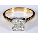 An 18ct yellow and white gold ring, with four invisible set diamonds, diamonds approx. 0.75ct,