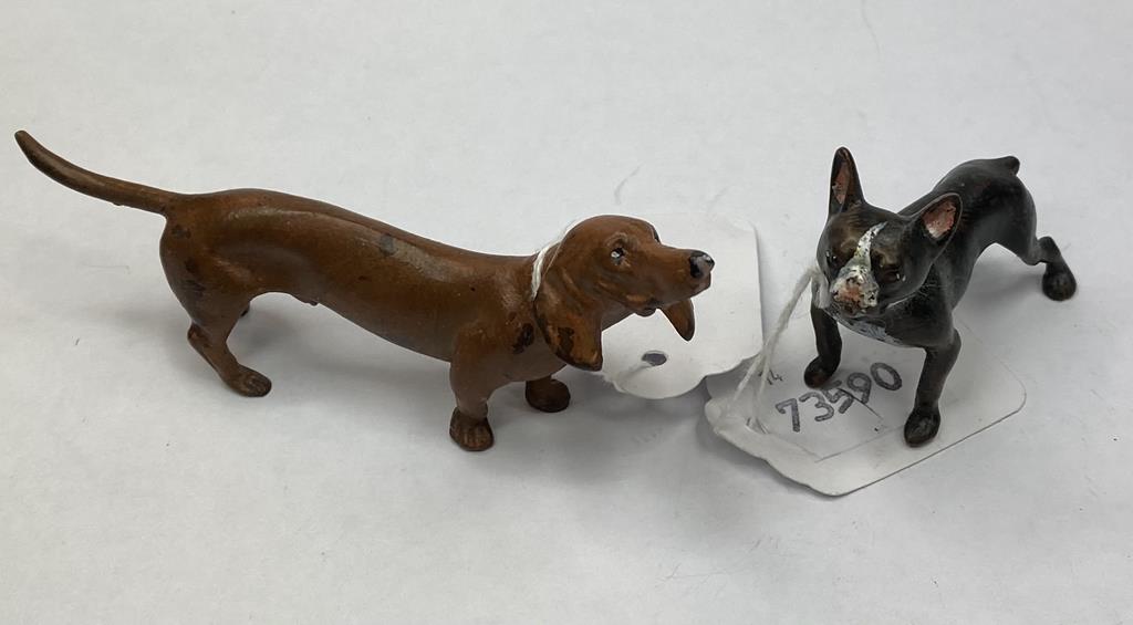 A modern painted metal figure of a French bulldog, 5 cm high, and another of a sausage dog (2)