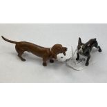 A modern painted metal figure of a French bulldog, 5 cm high, and another of a sausage dog (2)