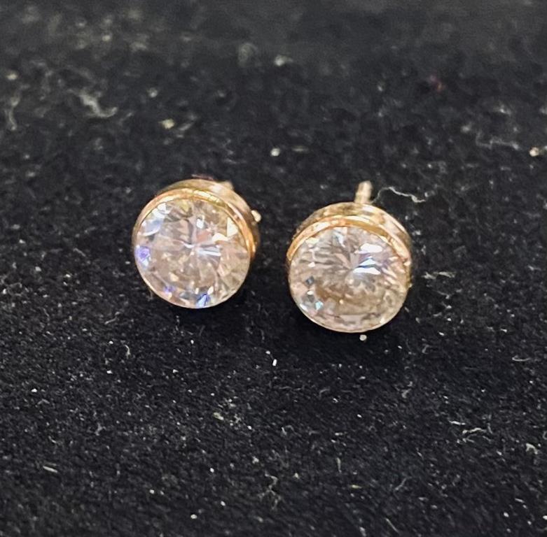 A pair of stud earrings