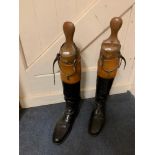 A pair of gentleman's brown and black leather riding boots with trees, and a pair of spurs (4)