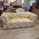 A Chesterfield sofa, 210 cm wide Possible iron frame 74 cm high, 96 cm deep, feet should be able