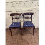 A set of six Regency style mahogany bar dining chairs, with drop in seats, on sabre legs, (6)