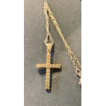 A 9ct gold and diamond set cross necklace Modern