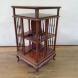 A mahogany revolving bookcase, 90 cm high, 50 cm wide